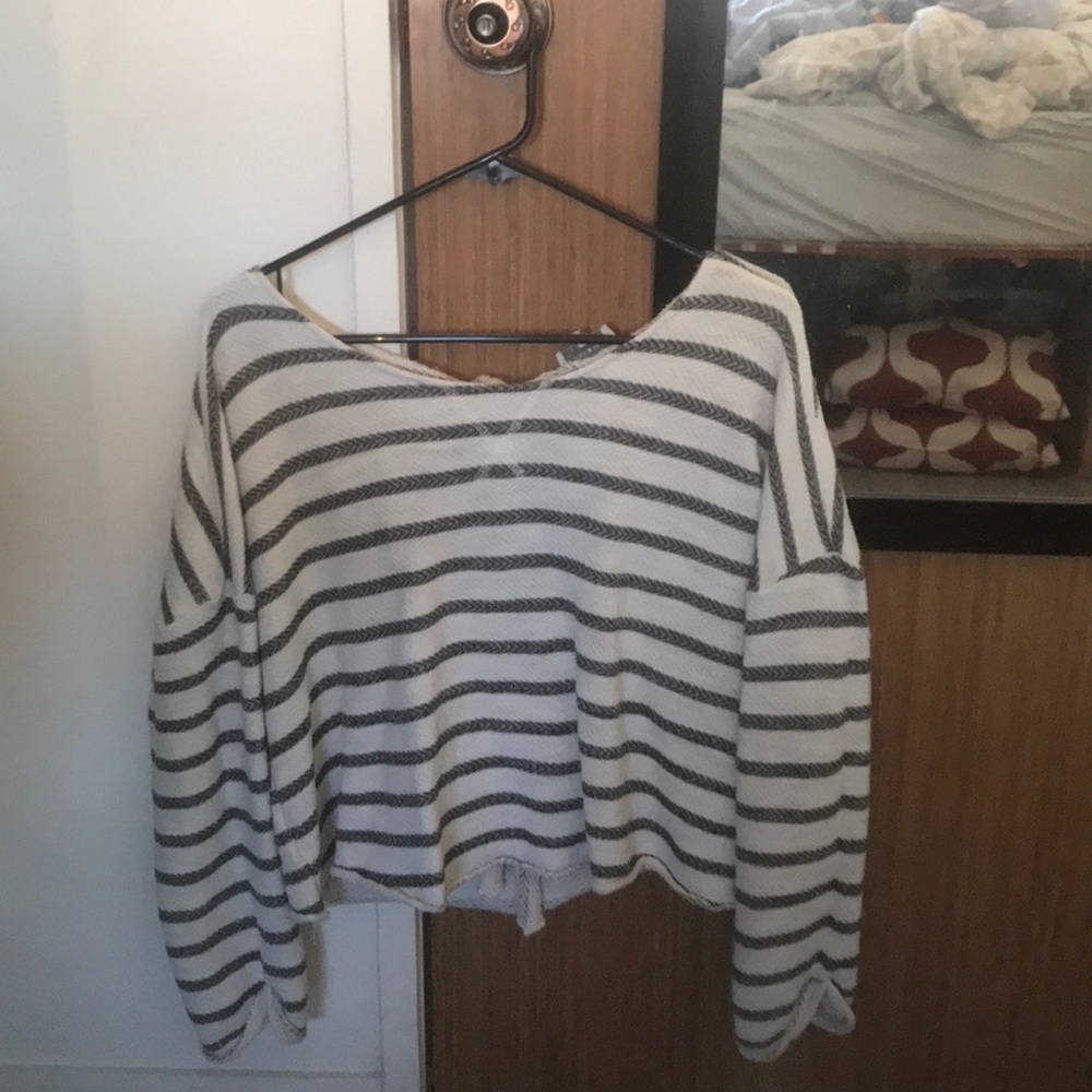 Super soft, open back pullover.